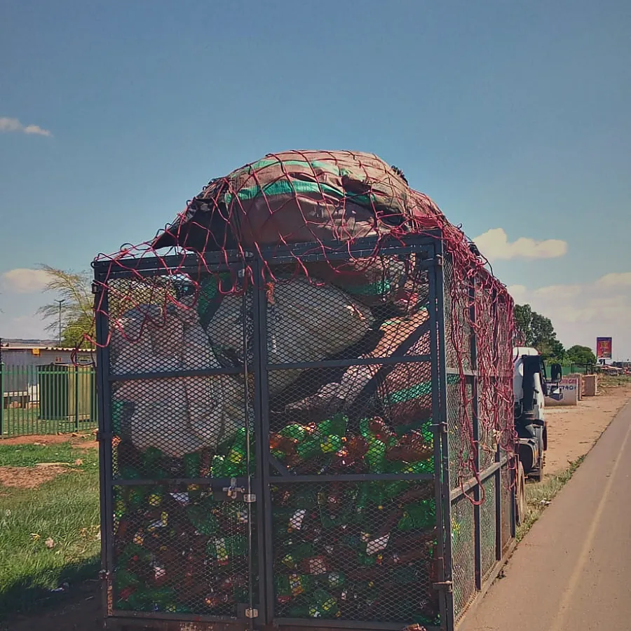 A Murero cage packed with recovered plastic bottles.
