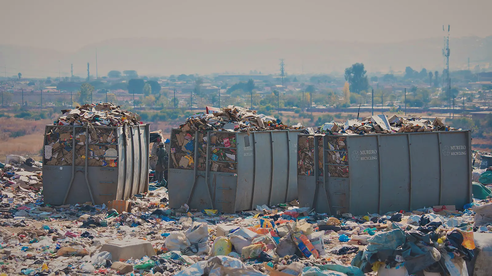 A row of Murero mesh cages filled with sorted material at the Pretoria sorting site.